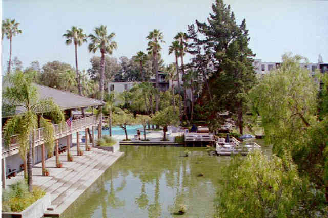 Gorgeous View of Main Pool, Lake, Clubhouse and Tennis Courts